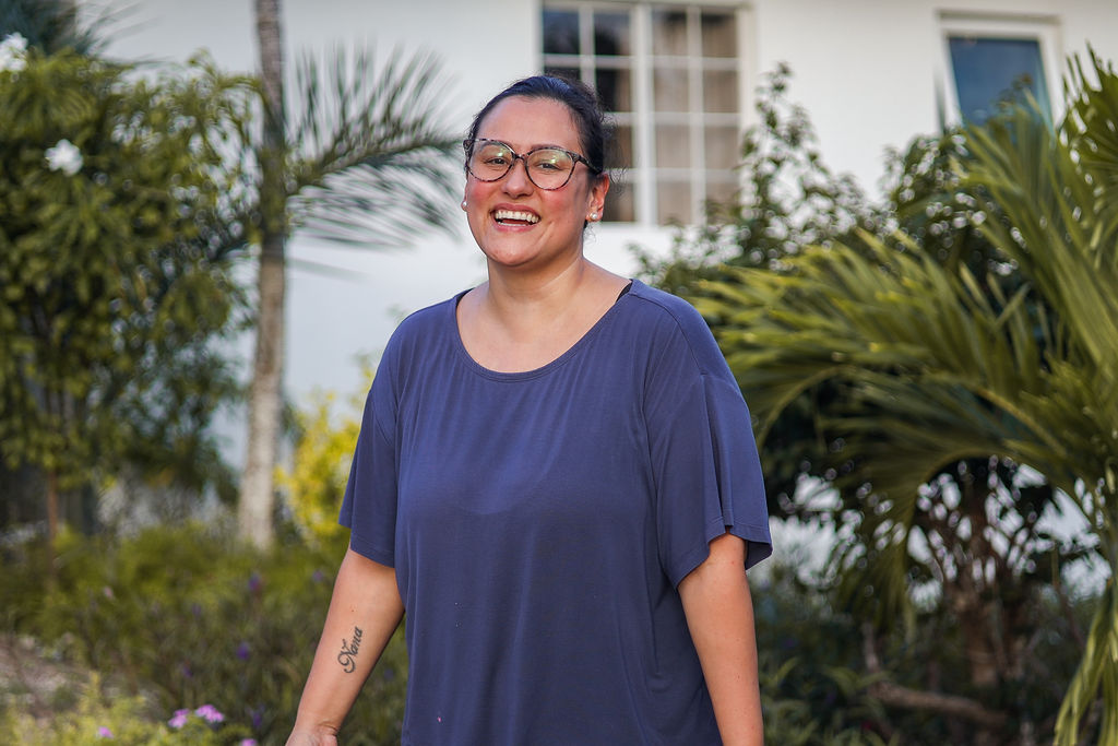 Jess Lenouvel from The Listings Lab Smiling at the Camera Wearing a Blue Shirt | Real Estate Facebook Ads